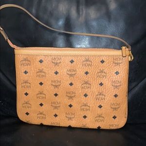 Small cognac MCM inner tote pouch.